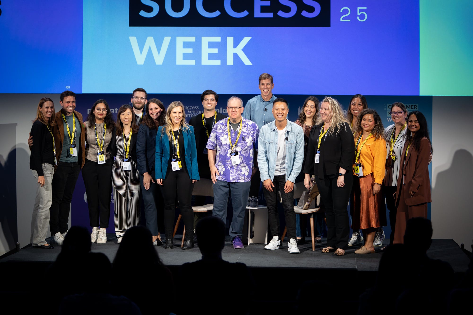 Customer Success Week speakers and community gathered on stage
